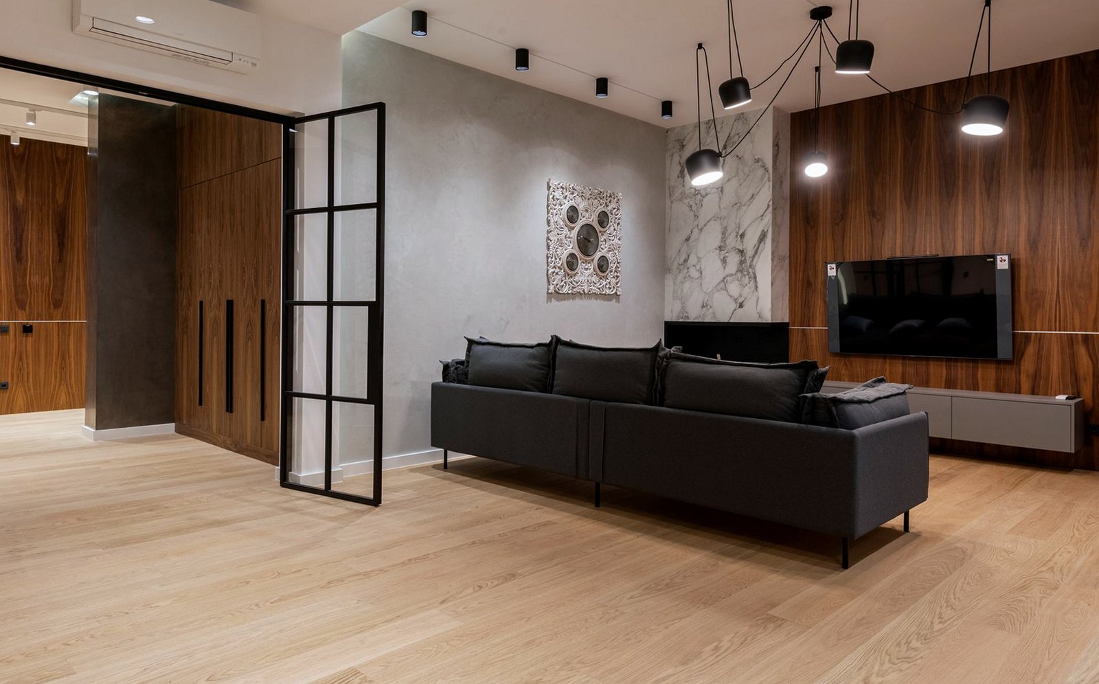 Newly laid oak wood flooring running through a sitting room